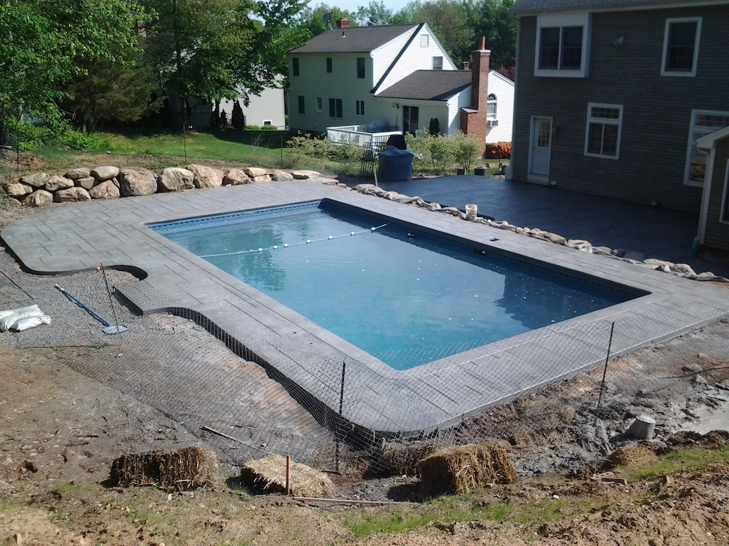 Swimming pool and stamped concrete project example 145